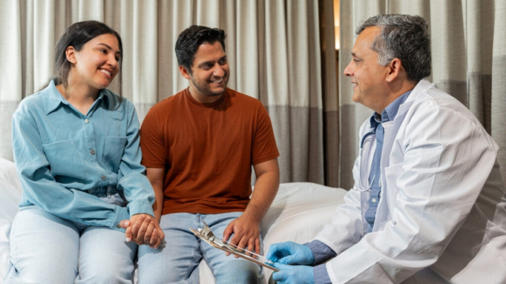 A couple talking with a doctor about a medical decision