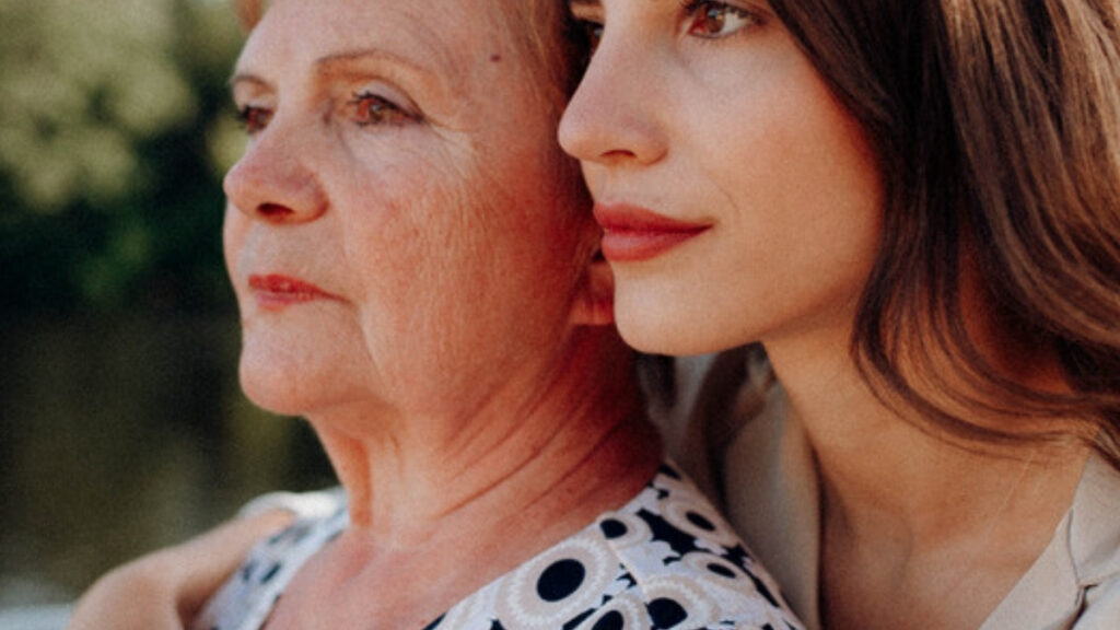 A daughter sitting with her mother after a death, when families call an estate planning lawyer in Fillmore