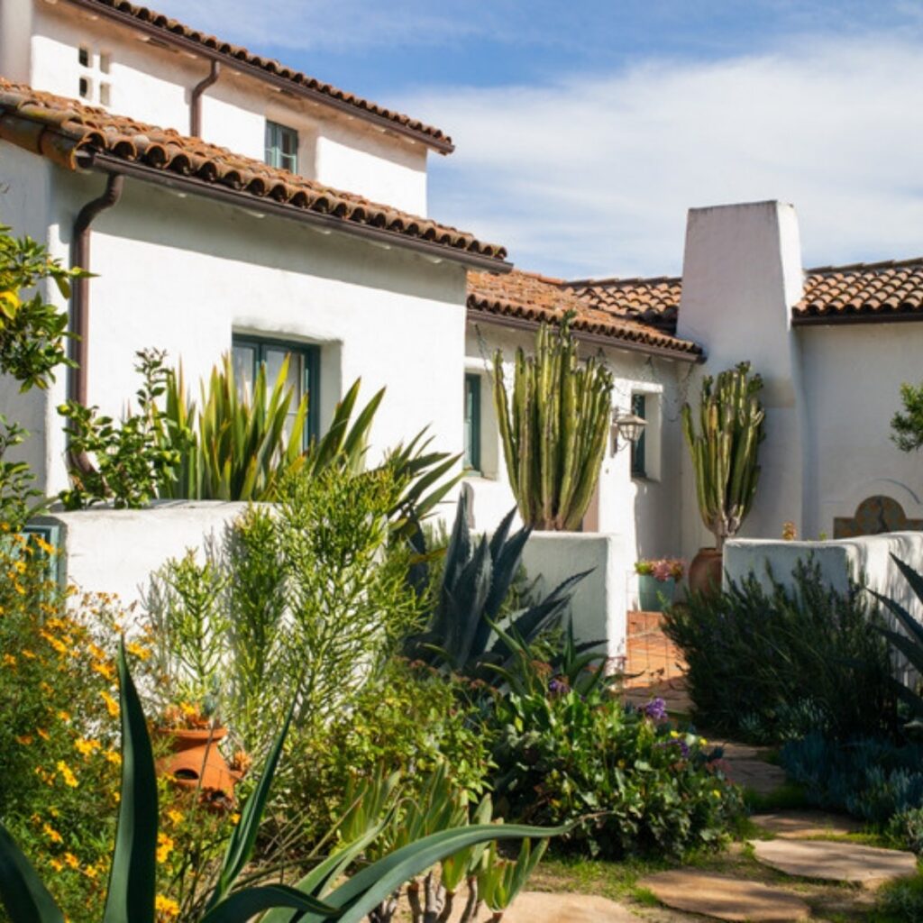 A Spanish style home with a tile roof and drought tolerant garden, often the largest asset an estate planning lawyer in Camarillo reviews