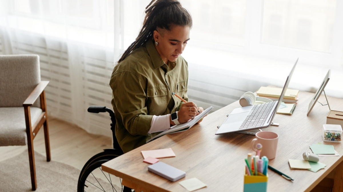 A young adult with a disability at work, whose family meets with a Camarillo limited conservatorship attorney