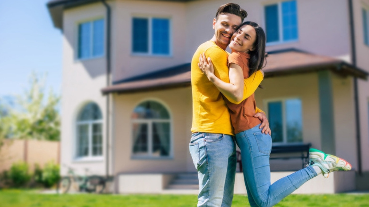 New owners outside the home an estate planning lawyer in Moorpark checks the grant deed for