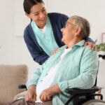 A care worker with an older woman at home, the situation a lawyer for powers of attorney in Camarillo plans for