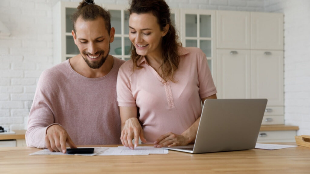 A couple at the kitchen table starting a first plan with an estate planning lawyer in Sherman Oaks