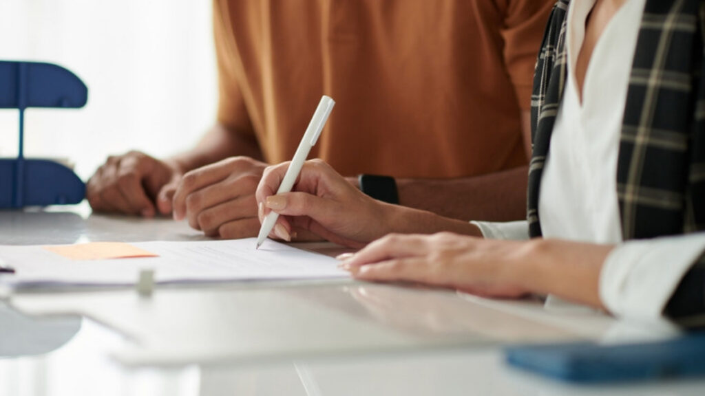 Spouses signing the trust an estate planning lawyer in Van Nuys prepared