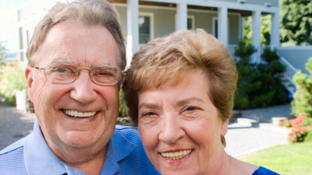Long time homeowners outside the house an estate planning lawyer in Ventura reviews for Proposition 19