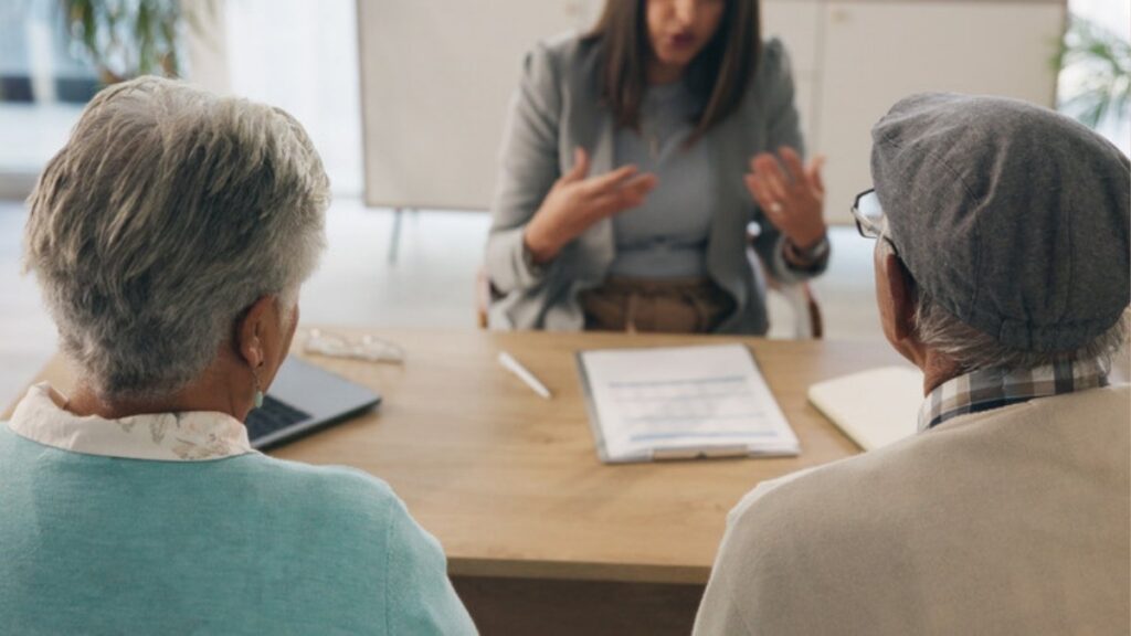 An older couple reviewing their will with a Camarillo wills attorney